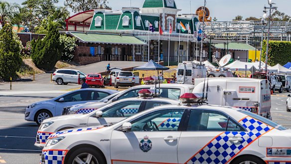 Police cars outside Dreamworld in October 2016, after the tragedy.