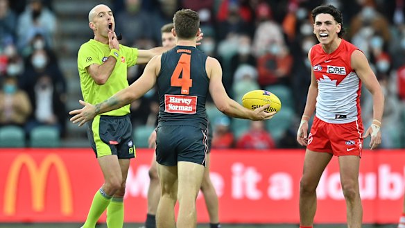 Toby Greene gives away another free kick.