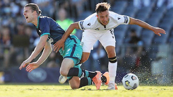 Alex Rufer, left,  tangles with Denis Genreau and, below, cops a red card from referee Stephen Lucas.