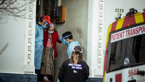 Residents of Hambleton House, Albert Park are picked up by Ambulance staff and moved to another facility. Hambleton House is currently under lockdown after a Covid-19 outbreak. 