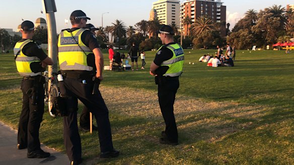 Police patrol St Kilda beach. 