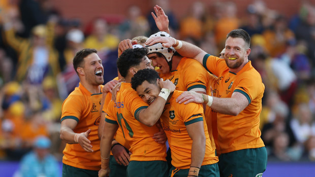 The Wallabies celebrate their win in Adelaide.