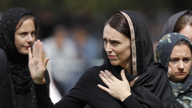 New Zealand Prime Minister Jacinda Ardern waves as she leaves Friday prayers at Hagley Park in Christchurch.