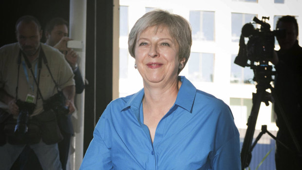 Britain's Prime Minister Theresa May arrives ahead of the annual Conservative Party Conference, in Birmingham, England, on Saturday.