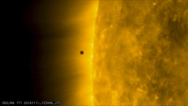This still image from video issued by NASA's Solar Dynamics Observatory shows Mercury as it passes between Earth and the sun on Monday, November 11.
