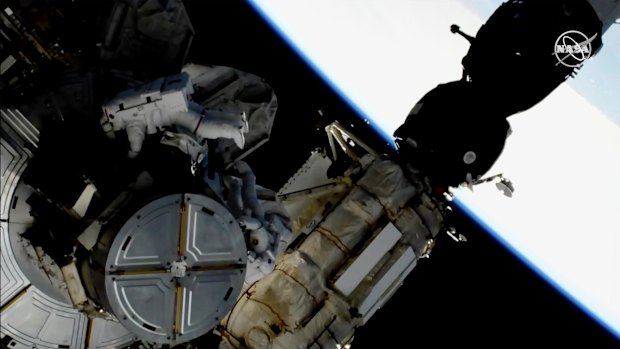 Astronauts Anne McClain and Nick Hague taking a spacewalk to replace ageing batteries on the International Space Station.