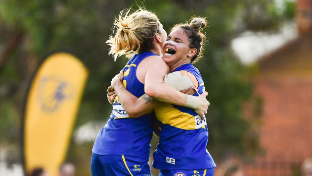 Imahra Cameron and Grace Kelly of the West Coast Eagles AFLW team that the Town of Victoria Park wants to still play football at Lathlain Park.