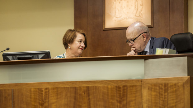 Deputy Chief Magistrate Jelena Popovic with journalist John Silvester on the bench.