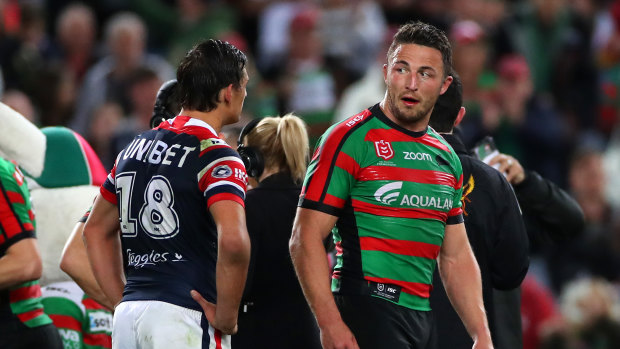 Come hair, kid: Sam Burgess and Roosters rookie Billy Smith exchange words.