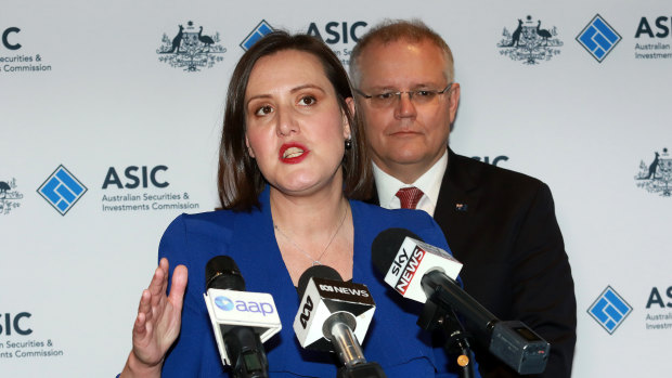 Minister for Revenue and Financial Services Kelly O'Dwyer (left) and Treasurer Scott Morrison, long opponents of a banking royal commission, hold a press conference at ASIC offices in Melbourne this week.