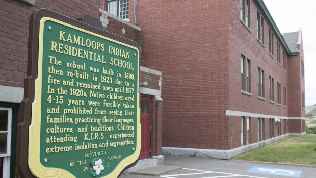 A plaque is seen outside of the former Kamloops Indian Residential School on Tk’emlups te Secwépemc First Nation in Kamloops, British Columbia, Canada.