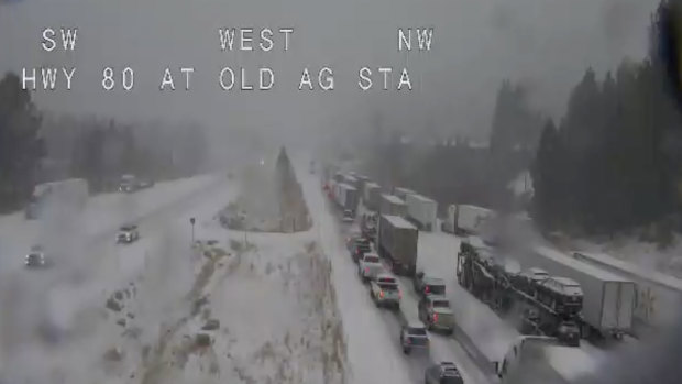 Remote video traffic camera footage shows traffic is stopped along California's Interstate 80 because of multiple spinouts.