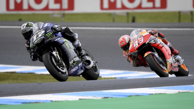 Giving chase: Race winner Marc Marquez (right) hot on the tail of Yamaha rider Maverick Vinales at the Philip Island circuit,