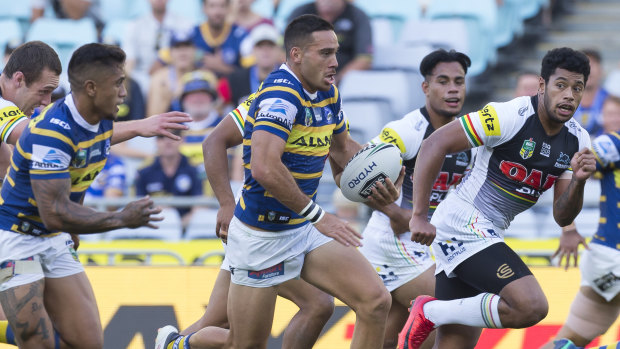 Run of play: Corey Norman spots a gap in the Panthers' defence.