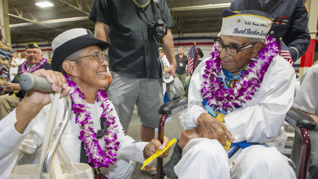 Kathleen Chavez, left, talks with her father Ray Chavez, right, then aged 104.