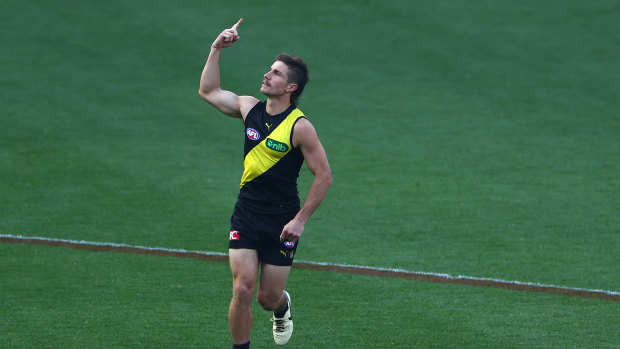 Tigers hold on against fighting Swans to claim first win under Yze; Saints midfielder cops one-match ban