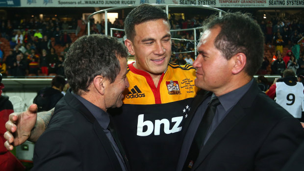 Sonny Bill Williams, centre, with Dave Rennie, right, after the Chiefs won the Super Rugby title in 2012.