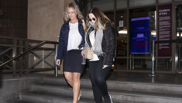 Sarah Ristevski (right) leaving Melbourne Magistrates Court after testifying on Tuesday.