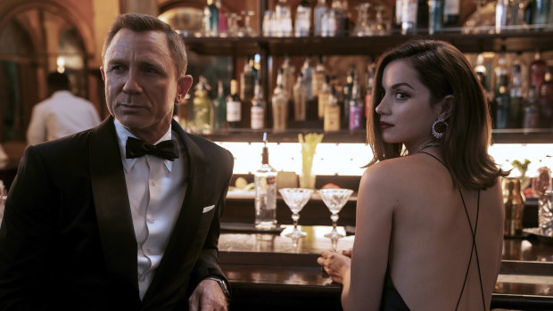 Daniel Craig with Ana de Armas in No Time To Die. Indestructible as ever.