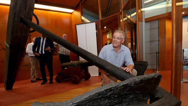 Prime Minister Scott Morrison with an anchor from James Cook's Endeavour during a visit to the Cooktown Museum. He visited Cooktown to announce $5.5 million in funding for Cooktown's 2020 festival. 
