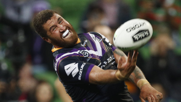 Try time: Kenny Bromwich celebrates his contribution to Melbourne's 10-point win over Brisbane.