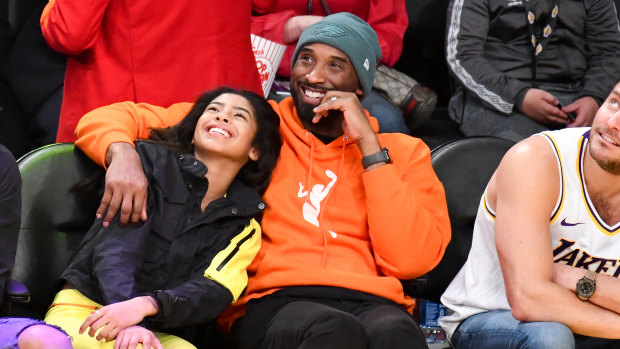 Kobe Bryant and daughter Gianna at a basketball game between the Los Angeles Lakers and the Dallas Mavericks at the Staples Center on December 29.