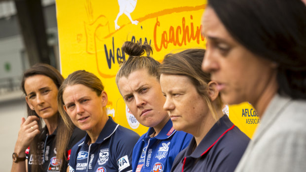 Looking to the future: Assistant coaches listen to AFLW head of football Nicole Livingstone speak.