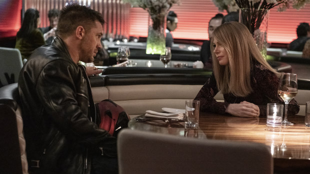 Tom Hardy, left, and Michelle Williams have been through a break-up in Venom: Let There Be Carnage.