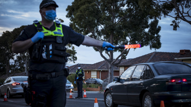 Police enforce lock-down restrictions in Broadmeadws.