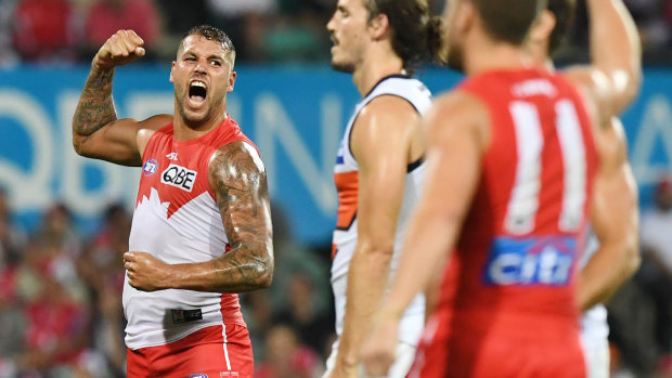 Derby delight: Lance Franklin kicks a goal against the Giants in round three.