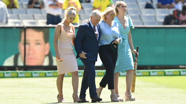 Augusta Jones, Allan Border, Jane Jones and Phoebe Jones at the MCG for the tribute to Dean Jones.