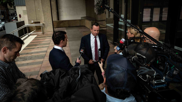 Mr McGowan addressing reporters outside court on Monday.