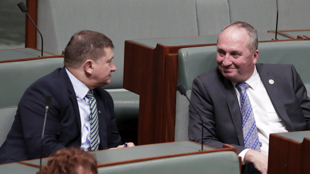 Llew O'Brien talks with Barnaby Joyce during Question Time, before Mr O'Brien was elected deputy speaker of the  House of Representatives.
