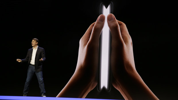 Samsung executive Justin Denison speaks about the Infinity Flex Display at a conference in November.