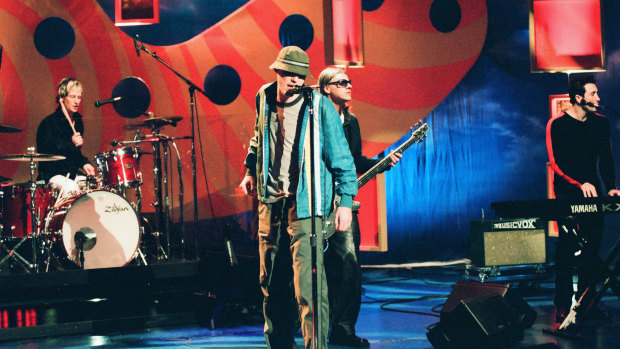 Josh Freese, Gregg Alexander, Sasha Krivtsov and Jim McGorman of New Radicals on The Tonight Show with Jay Leno in 1999. 