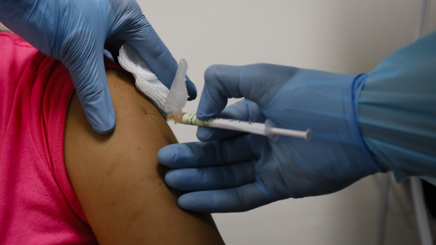 A failure to roll out a vaccine next year would result in a 1 per cent hit to gross domestic product, or $55 billion over two years.