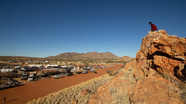 The race track and rodeo arena is seen from the natural amphitheatre during the 71st annual Harts Range Races and Rodeo, approximately 215km east of Alice Springs.