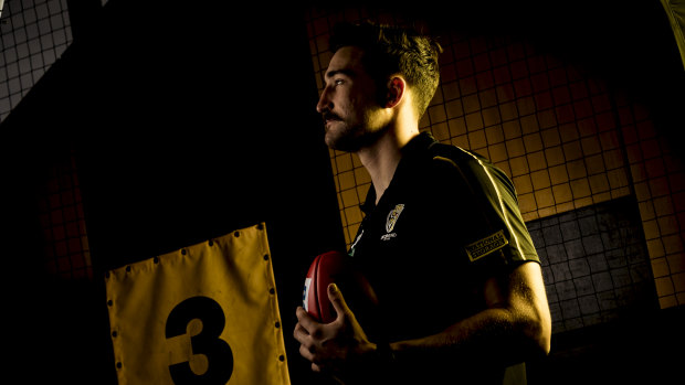 Waiting game: Ivan Soldo in the Punt Road rooms during Richmond's training session on Sunday.