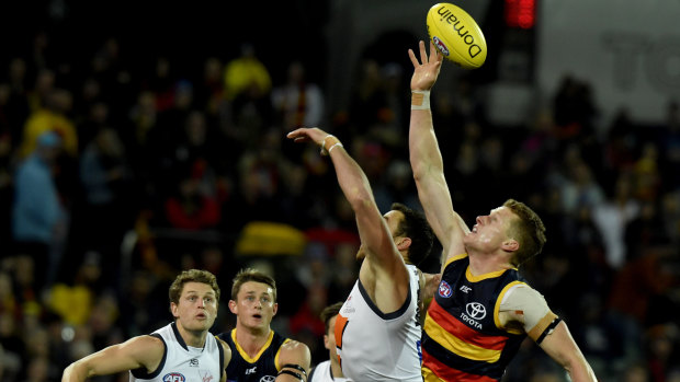 On tap: Adelaide's Reilly O'Brien flies up in a contest during the round 12 win over the Giants.