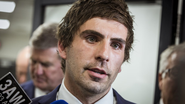 Andrew Gaff leaves the tribunal.