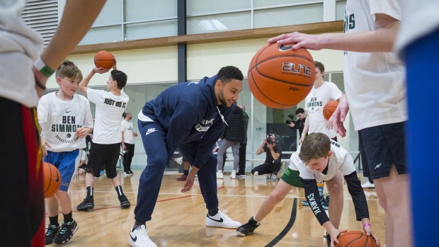 NBA star Ben Simmons with kids at his basketball camp in Donvale.