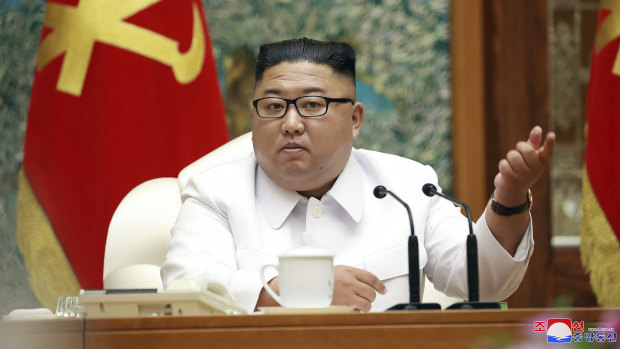 In this photo provided by the North Korean government, Kim Jong-un attends an emergency Politburo meeting in Pyongyang on Saturday, July 25, 2020. 