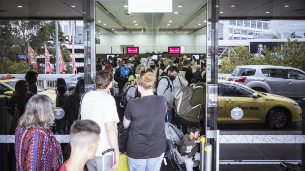 Large queues formed at Melbourne Airport’s terminal 3 departures on Tuesday.