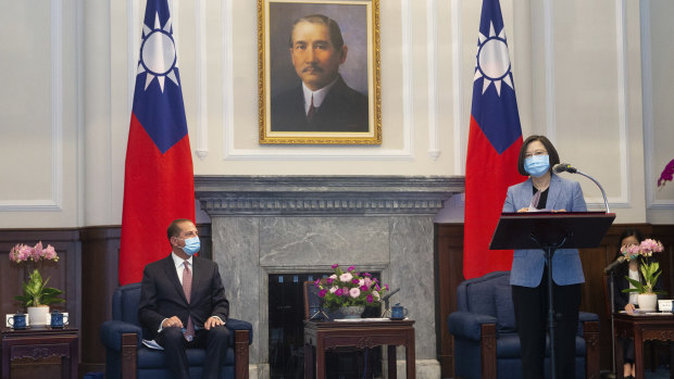 US Health Secretary Alex Azar, left, listens as Taiwan's President Tsai Ing-wen talks on Monday. 