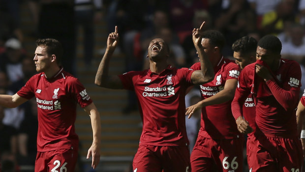 Travels: Liverpool's Georginio Wijnaldum (centre) scored his first EPL road goal in the victory over Tottenham.
