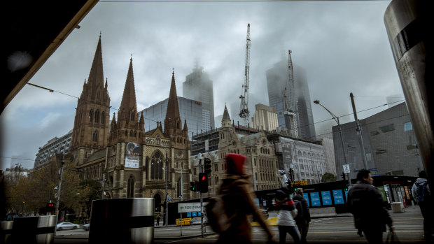 Fog over Melbourne on Sunday - the coldest June day since 1985, with Monday set to be even colder.