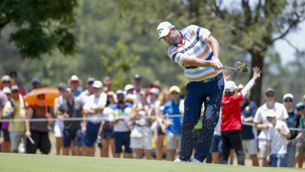 Chasing pack: Marc Leishman will try to hunt down Cameron Smith on the final day of the Australian PGA.