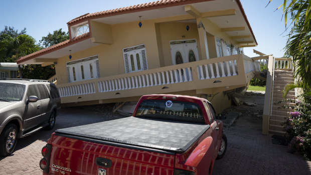 A house in Guayanilla, Puerto Rico, is knocked off its foundations by Tuesday's earthquake. 