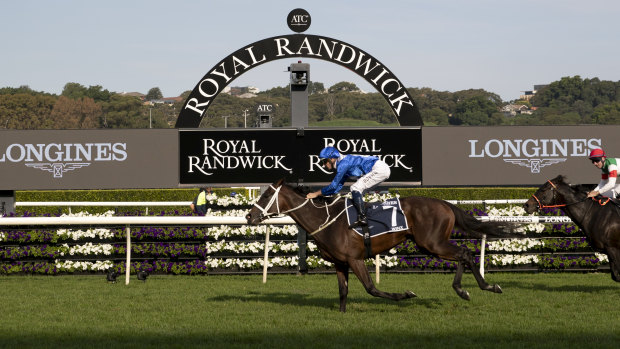 Snapshot: Winx crosses for her 33rd straight victory.