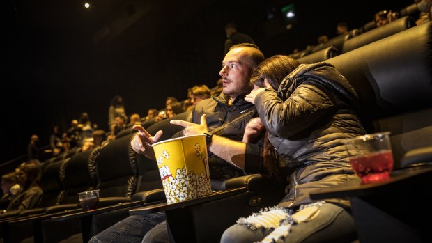 Ekrem Karakos and Alev Babayigit enjoy a movie in cinemas at Chadstone after restrictions ease.